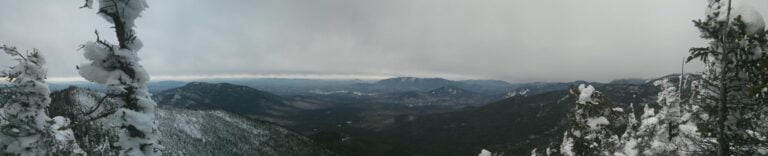 Panoramic view from top of Mt. Allen showing a valley in the Adirondacks in winter