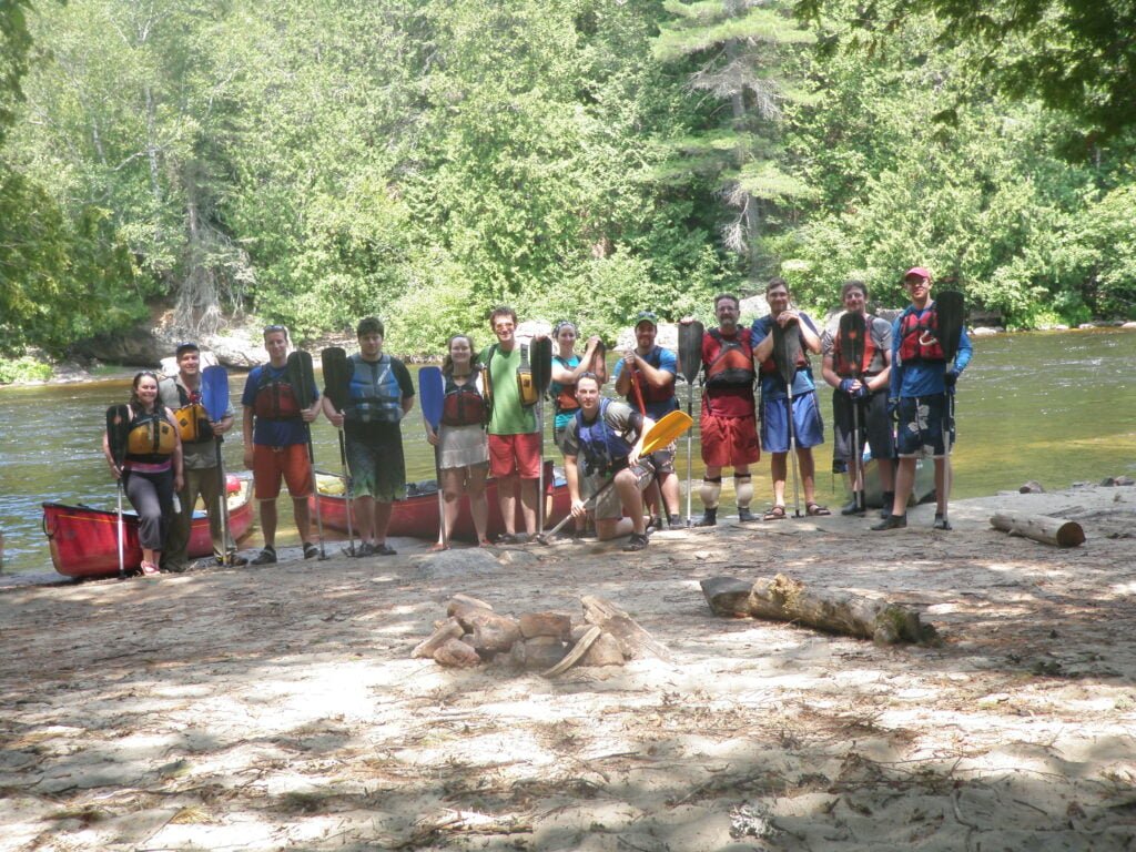 Group picture of canoe-campers after completing Noire river