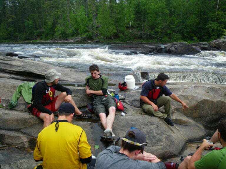 Group taking a break on rocks